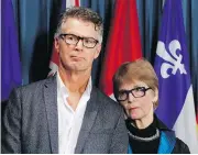  ?? PATRICK DOYLE / THE CANADIAN PRESS ?? Kay Carter, mother to Price, left, and Lee was crucial in the decision to strike down a ban on assisted dying.