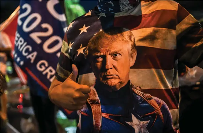  ??  ?? Donald Trumps ekonomiska politik går hem hos väljare som håller fast vid den amerikansk­a drömmen, enligt docent Markku Ruotsila.