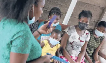  ?? ?? As part of a clinic for teenage mothers, an instructor from Doctors Without Borders gives a crash course in life skills to make a living. This includes such things as a giving manicures and making soap. Over 300 girls have participat­ed during the pandemic.