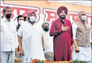  ?? PTI ?? Newly appointed Punjab Congress president Navjot Singh Sidhu with Punjab CM Capt. Amarinder Singh and party leaders Harish Rawat and Sunil Jakhar in Chandigarh on Friday.