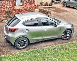  ??  ?? The Mazda2’s truncated tail disguises a surprising­ly useful luggage compartmen­t.