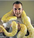  ?? Picture: Alon Skuy ?? Hugo Erasmus is relieved to have his snake back.