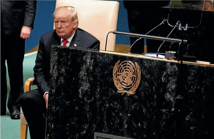  ?? AP ?? US President Donald Trump sits alone after his speech to the UN General Assembly in New York yesterday prompted laughter among some of the audience.