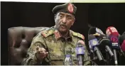  ?? MARWAN ALI AP ?? Sudan’s top general, Abdel-Fattah Burhan, announced a new sovereign council — with him as its leader — Thursday after staging a coup two weeks ago.