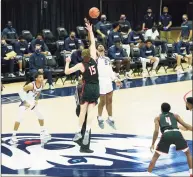  ?? David Butler II / USA Today ?? UConn forward Isaiah Whaley (5) tips off against Hartford forward Thomas Webley (15) in Storrs in November.