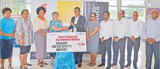  ?? Picture: SUPPLIED ?? FASANOC Sports Developmen­t manager Lyndall Fisher receives sponsorshi­p cheque on behalf of FASANOC from Asco Motors chief executive officer Ronald Kumar.