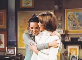  ?? CBS via Getty Images ?? VALERIE Harper, left, and Mary Tyler Moore are reunited on CBS’ “Rhoda.”
