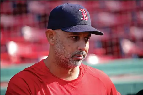  ?? STUART CAHILL — BOSTON HERALD ?? BOSTON, MA - May 20: Boston Red Sox manager Alex Cora (13) chats with the media prior to the game as the Red Sox take on the Mariners at Fenway Park on May 20, 2022 in , BOSTON, MA.