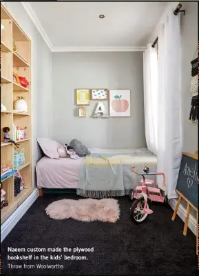  ??  ?? Naeem custom made the plywood bookshelf in the kids’ bedroom. Throw from Woolworths