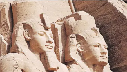  ??  ?? Carved images of the mighty pharaoh Ramses II adorn his Abu Simbel temple in Egypt.