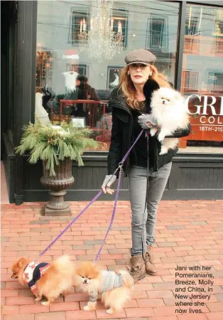  ??  ?? Jani with her Pomeranian­s, Breeze, Molly and China, in New Jersery where she now lives.