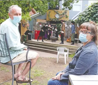  ??  ?? Paul Keen and Cynthia Sugars were mounting a student Shakespear­e production in their backyard at 57 Glen Ave. before it was shut down by bylaw officers. The play will be allowed to go ahead, perhaps at a nearby tennis club.