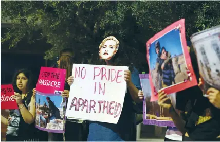  ?? (Ammar Awad/Reuters) ?? SUPPORTERS OF the BDS movement protest outside the venue of the 2019 Eurovision song contest final, in Tel Aviv, in 2019.