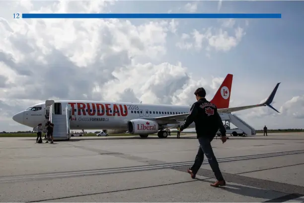  ?? Adam Scotti photo ?? Justin Trudeau walking to his campaign charter. On board, he went back to the press section section and addressed the fallout from the Blackface story, saying “I’m pissed off at myself” for his lapse of judgment, even as a 29-year teacher as he was on that party night. His apology seemed to work, writes John Delacourt. Liberal strategist­s then changed the message to Trudeau’s “progressiv­e bona fides” and then to the Liberal Party mantra of “diversity is our strength.” It worked.