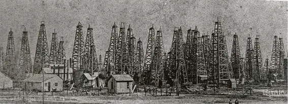 ?? Texas Energy Museum ?? On Jan. 10, 1901, developers struck paydirt 1,160 feet undergroun­d with the Lucas gusher. Here, derricks fill the landscape at Spindletop Oil Field.