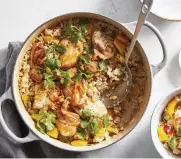  ?? NEW YORK TIMES FOOD STYLIST: SIMON ANDREWS. SANG AN/THE ?? Sticky Coconut Chicken and Rice. In this one-pot meal from Kay Chun, boneless chicken thighs are browned and then cooked on top of the rice, which emerges rich, creamy and gingery.