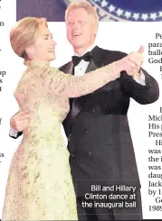  ??  ?? Bill and Hillary Clinton dance at the inaugural ball