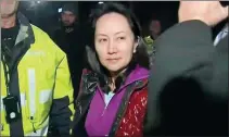  ?? AP ?? Meng Wanzhou, Huawei’s chief financial officer, walks out of the High Court of British Columbia in Vancouver on Tuesday.