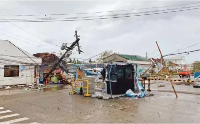  ?? Picture: AFP ?? AFTERMATH. This image, received courtesy of Jung Byung-joon, yesterday shows damage caused by Typhoon Phanfone outside Kalibo Internatio­nal Airport in Kalibo, the capital of Aklan province.