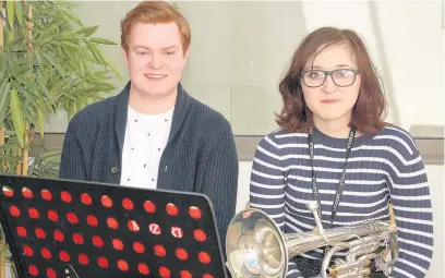  ??  ?? Sonny Fielding and Jennie Worrall, music students at Cronton Sixth Form College