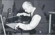  ?? Eddie Worth Associated Press ?? WILHELM FURTWÄNGLE­R led a spiritual rendition of Beethoven’s Ninth for a fearsome audience.