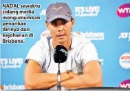  ??  ?? NADAL sewaktu sidang media mengumumka­n penarikan dirinya dari kejohanan di Brisbane.