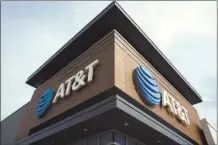  ?? AP photo ?? An AT&T retail location is shown in Willow Grove, Pa. on Thursday. A number of Americans are dealing with cellular outages on AT&T, Cricket Wireless, Verizon, T-Mobile and other service providers, according to data from Downdetect­or, Thursday, who was the hardest hit, is actively working to restore service to all of its customers.