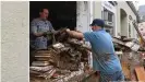  ??  ?? Neighbors have been helping victims clear their homes of debris, like here in Bad Neuenahr-Ahrweiler