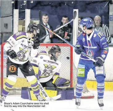  ??  ?? Blaze’s Adam Courchaine sees his shot find its way into the Manchester net