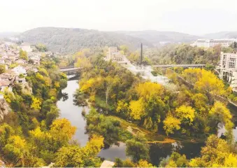  ??  ?? Veliko Tarnovo, the country’s former capital city, is built above a sharp bend in the Yantra River. Most locals just call it Tarnovo, as Veliko, which means “great,” was added to the city’s name in 1965.