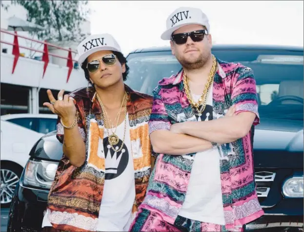  ??  ?? Bruno Mars and James Corden as seen in “Carpool Karaoke”