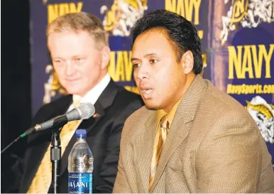  ?? FILE PHOTO ?? Navy athletic director Chet Gladchuk (left) and head coach Ken Niumatalol­o have engaged in many discussion­s over the years about the direction of the Navy football program and said “our dialogue has always been constructi­ve, has always been well intended and has always been in the best interests of the program.”