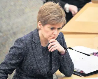  ??  ?? Coronaviru­s First Minister Nicola Sturgeon announced the latest rules in Holyrood last week