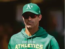  ?? Paul Sancya / Associated Press ?? A’s bench coach Brad Ausmus, 53, doesn’t look far removed fitness-wise from his playing days, says manager Mark Kotsay.