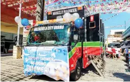 ?? (Valenzuela City PIO) ?? SHOWER TRUCK – One of the two pwestong Presko: Libreng Shower Ngayong Summer trucks in Valenzuela City to help beat the summer heat.