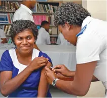  ?? Photo: DEPTFO News ?? One of the students of Navesau Adventist High School gets vaccinated on April 5, 2018.