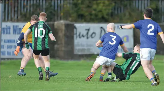  ??  ?? GOAL: Dermot Mone (11) slots the ball past Annanough ‘keeper Sean Hennessey. Pictures: Ken Finegan