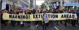  ?? ?? FLASHPOINT: Climate protesters marching in Central London in October