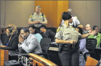  ?? KENT D. JOHNSON / AJC ?? Extra Fulton County deputies are stationed in the courtroom before the verdicts are read on Wednesday in the Atlanta Public Schools test-cheating trial.