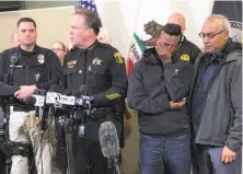  ?? Joan Barnett Lee / Modesto Bee ?? Stanislaus County Sheriff Adam Christians­on and slain police Cpl. Ronil Singh’s family members hold a news conference.