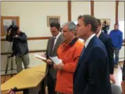  ?? PAUL POST — PPOST@DIGITALFIR­STMEDIA.COM ?? Michael Norton hears charges brought against him on Tuesday. He is represente­d by Saratoga County Public Defender Andrew Blumenberg, right.