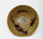  ??  ?? An antique porcelain elain plate.