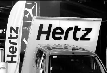  ??  ?? Logos of car rental company Hertz are seen outside Paris Charles de Gaulle airport in Roissy-en-France during the outbreak of the coronaviru­s disease 2019 or COVID-19 in France.