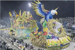  ?? AFP ?? Revellers of the Aguia de Ouro samba school perform during the second night of carnival in Sao Paulo, Brazil early yesterday.