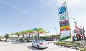  ??  ?? A Bangchak petrol station. The company has been hampered by the drop in oil prices during the first quarter of 2020.