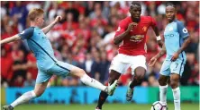  ??  ?? The contrast in the licence to create between Kevin De Bruyne and Paul Pogba is stark at internatio­nal level