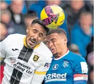  ?? ?? Cristian Montano and James Tavernier in action
