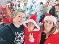  ??  ?? From left: Merriol Baldwin, Lorna Scott and Deborah Fyfe who organised the Santa Dash.