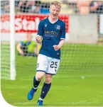  ??  ?? Dundee’s Lyall Cameron celebrates after scoring