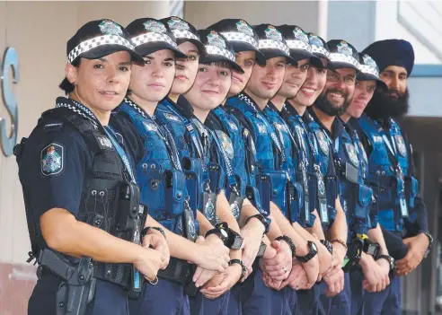  ?? Picture: JUSTIN BRIERTY ?? READY TO GO: The 11 new constables, Izzy Allam, Tara Buckley, Holly Reilly, Arantxa Love, Dave Coleman, Jon Hanley, Jake Hughes, Aaron Hartwell, Jason Hanna, Matt Cole and Jasdeep Atwal, who started duty yesterday in front of the Cairns Police Station...